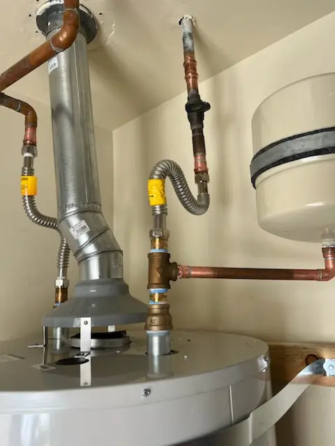 Water heater installation and plumbing repair in Moon